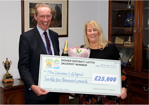 Cllr Trevor Bartlett, DDC Leader congratulates Suzanne Letchford as the first jackpot winner of the Dover District Lotto